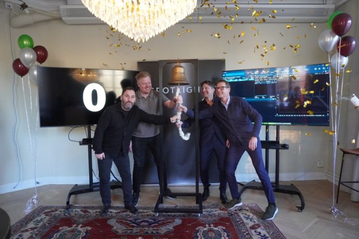 macbook pro on brown wooden table